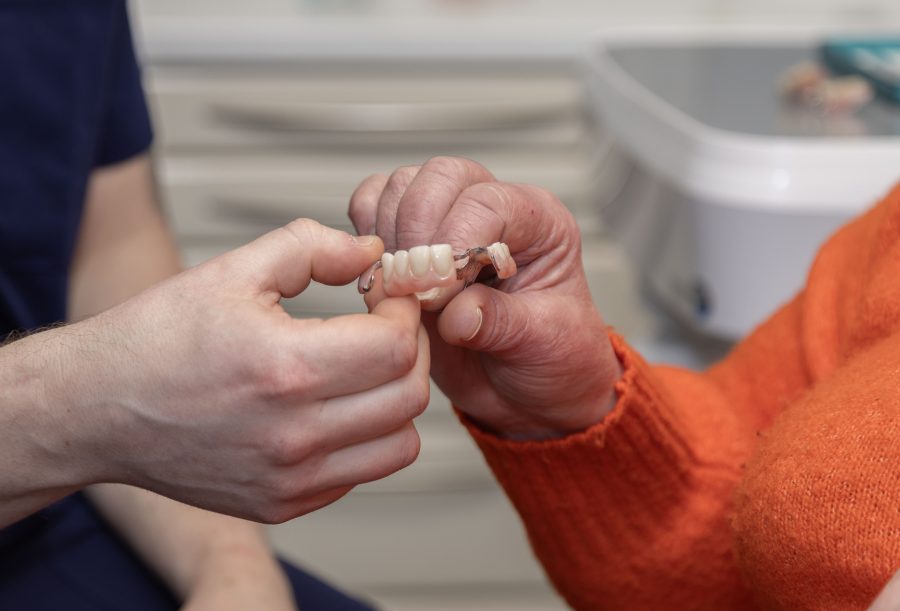 Why have dentures? image